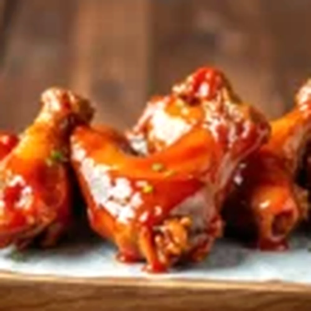 Honey BBQ Wings plated for a Texas family table, overhead view